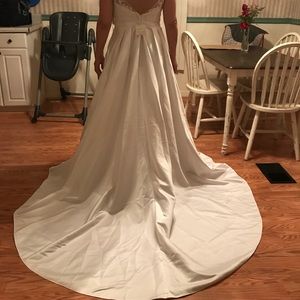 Never used, tagged ballgown wedding dress